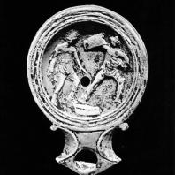 Римский светильник с изображением борьбы гладиаторов. Терракота. II в.н.э. Греко-римский музей в Александрии